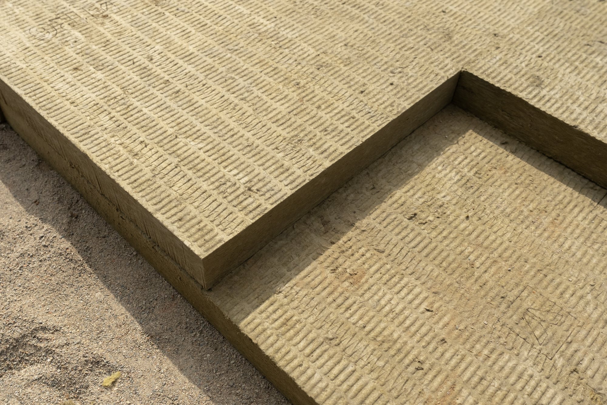 Rigid mineral wool board, the insulation under the slab.
