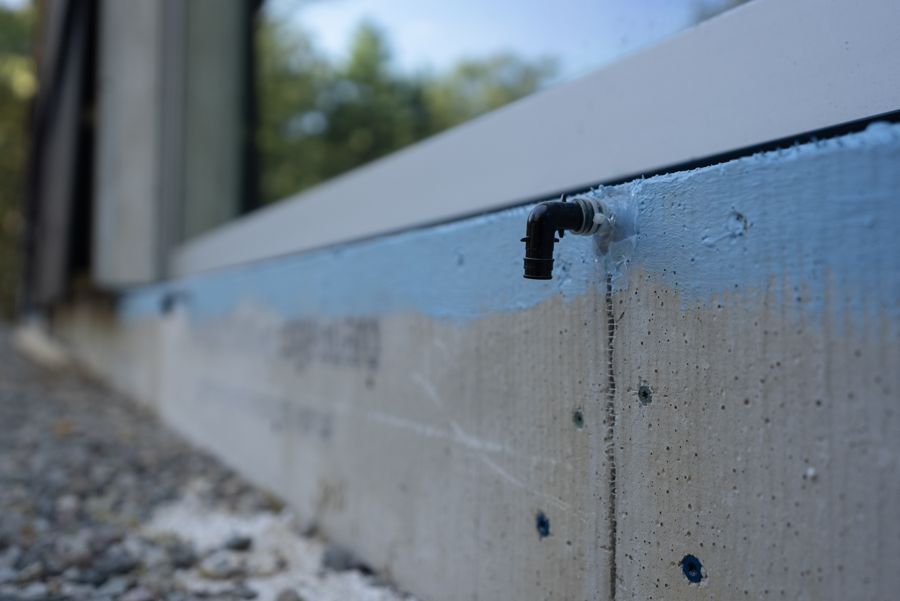 The edge of the slab below a lift-slide unit.