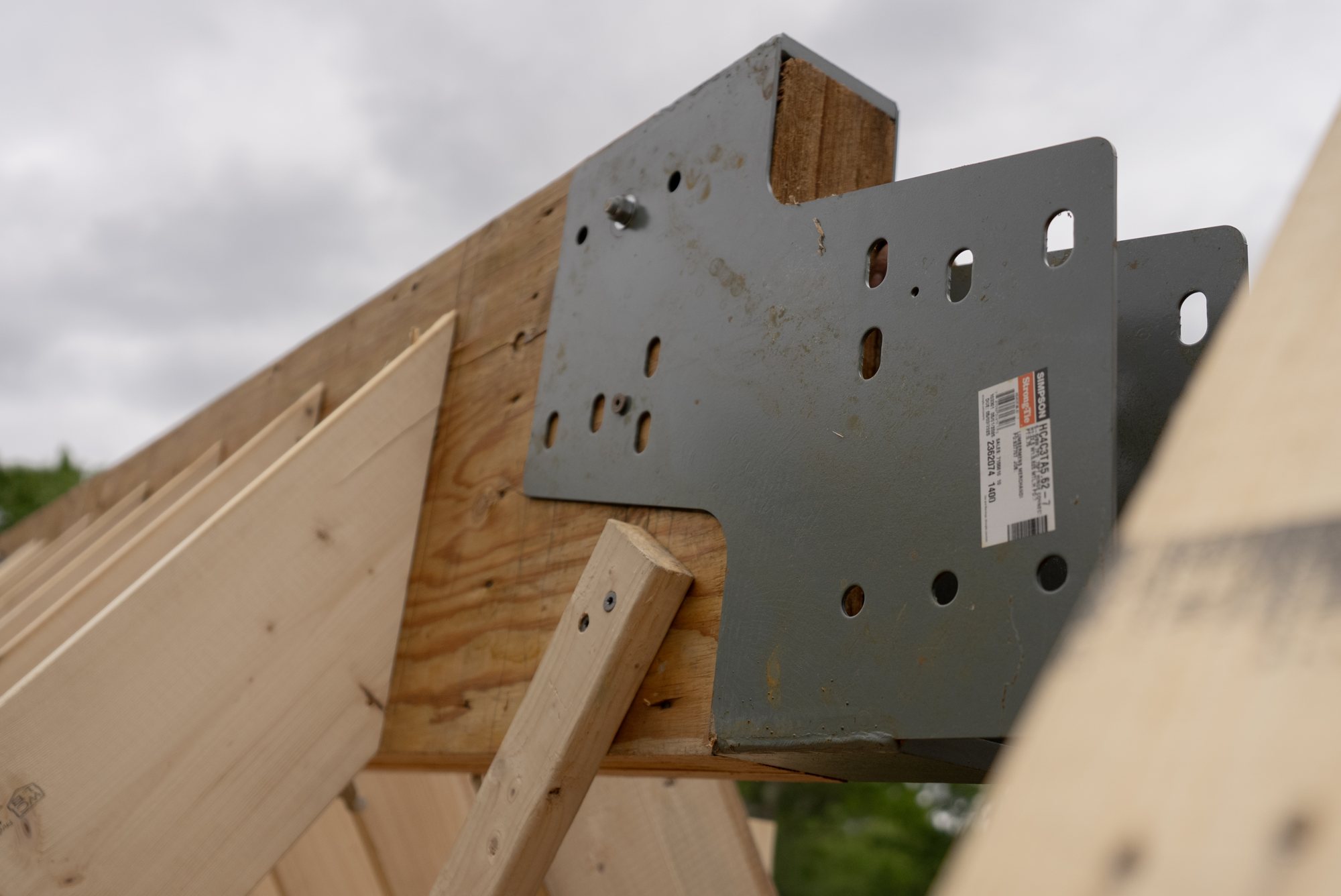 A steel connector at the ridge.