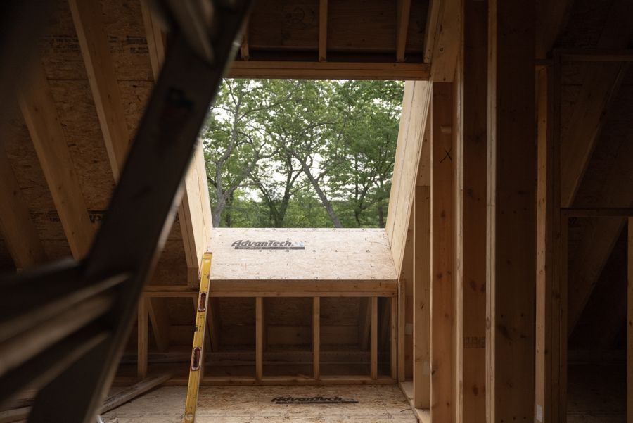 An opening framed in the roof.