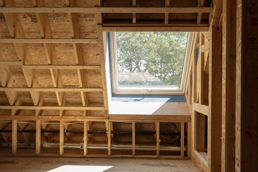 A roof window set in the framing.
