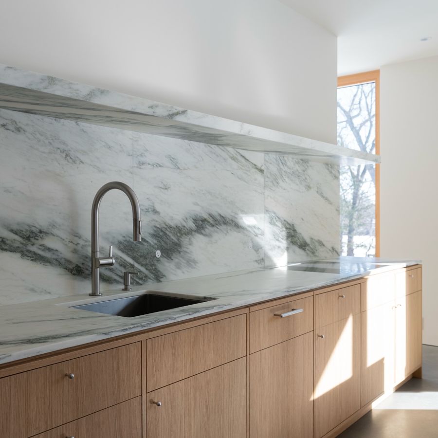 Danby marble counter, backsplash and shelf over white oak.