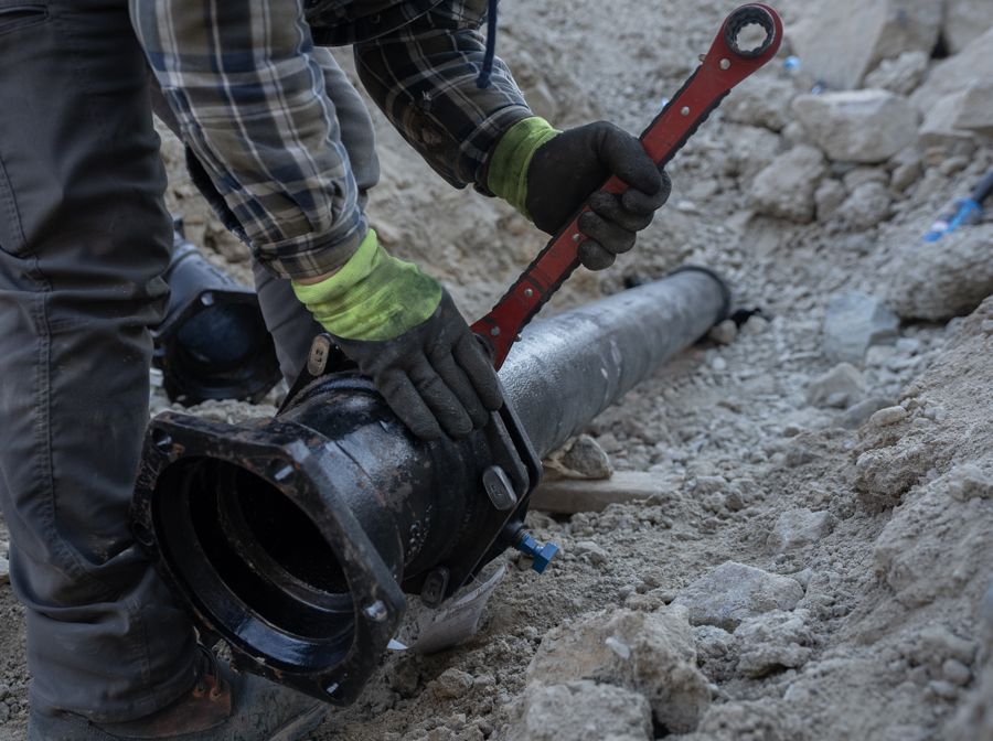 Joining two lengths of culvert pipe.