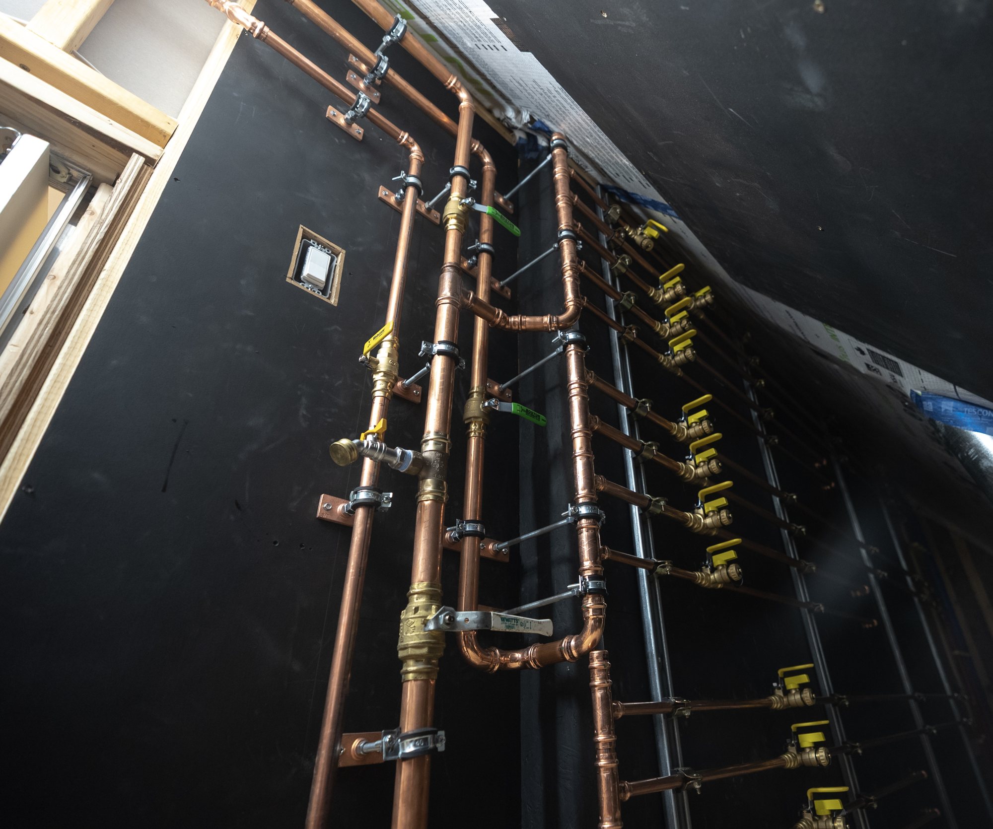 Copper water lines and valves.