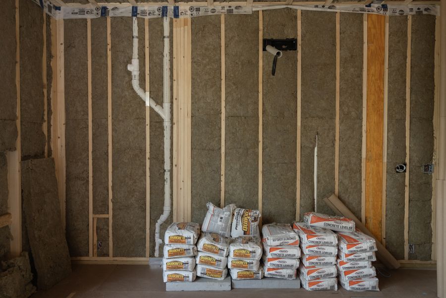 Pipework in an insulated wall.