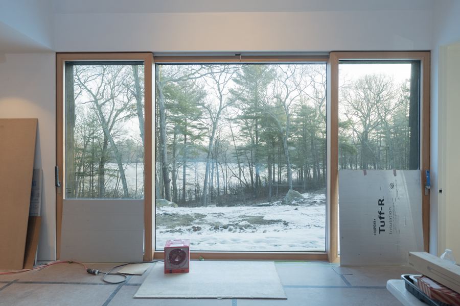 The first-floor glass in winter, looking toward the pond.