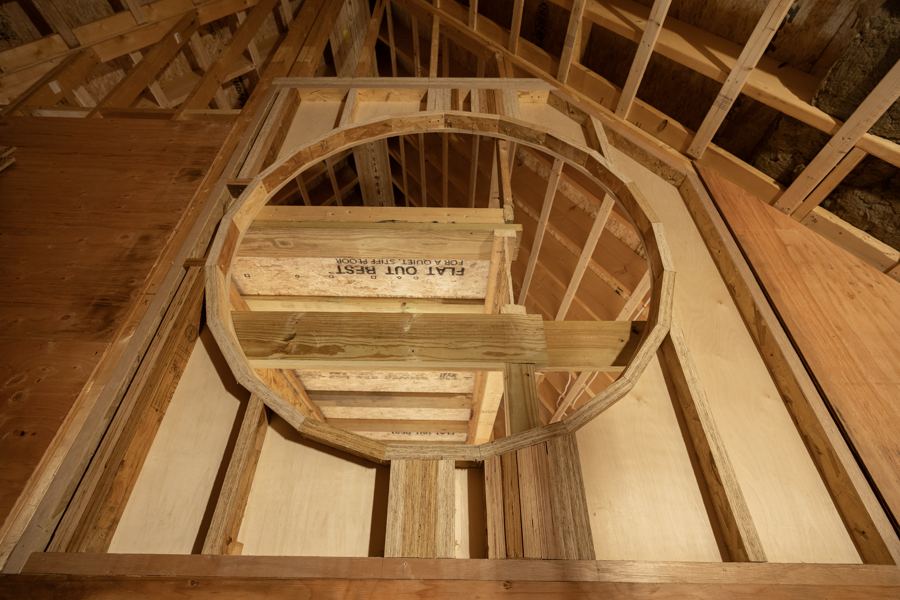 Framing for the circular opening on the second floor.