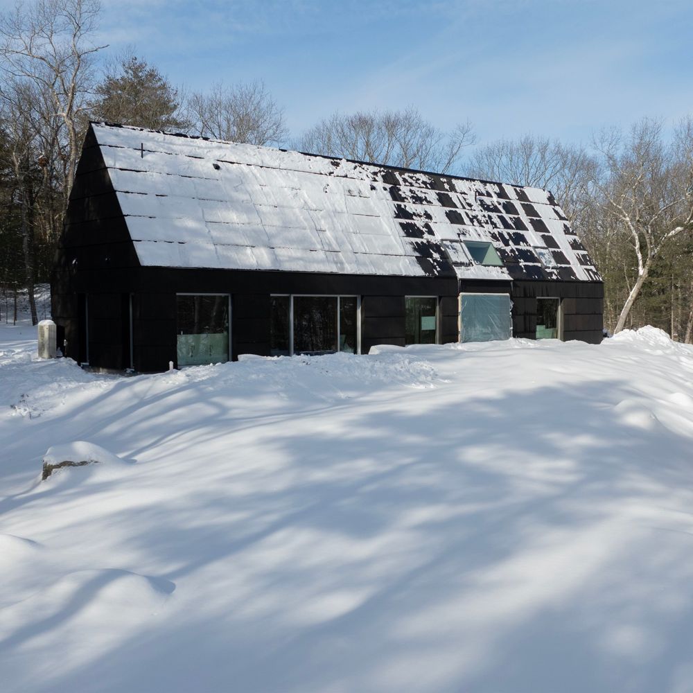 The black house in snow